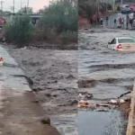 Conductor desafía la creciente del río Pesquería y queda atrapado en pleno desborde.